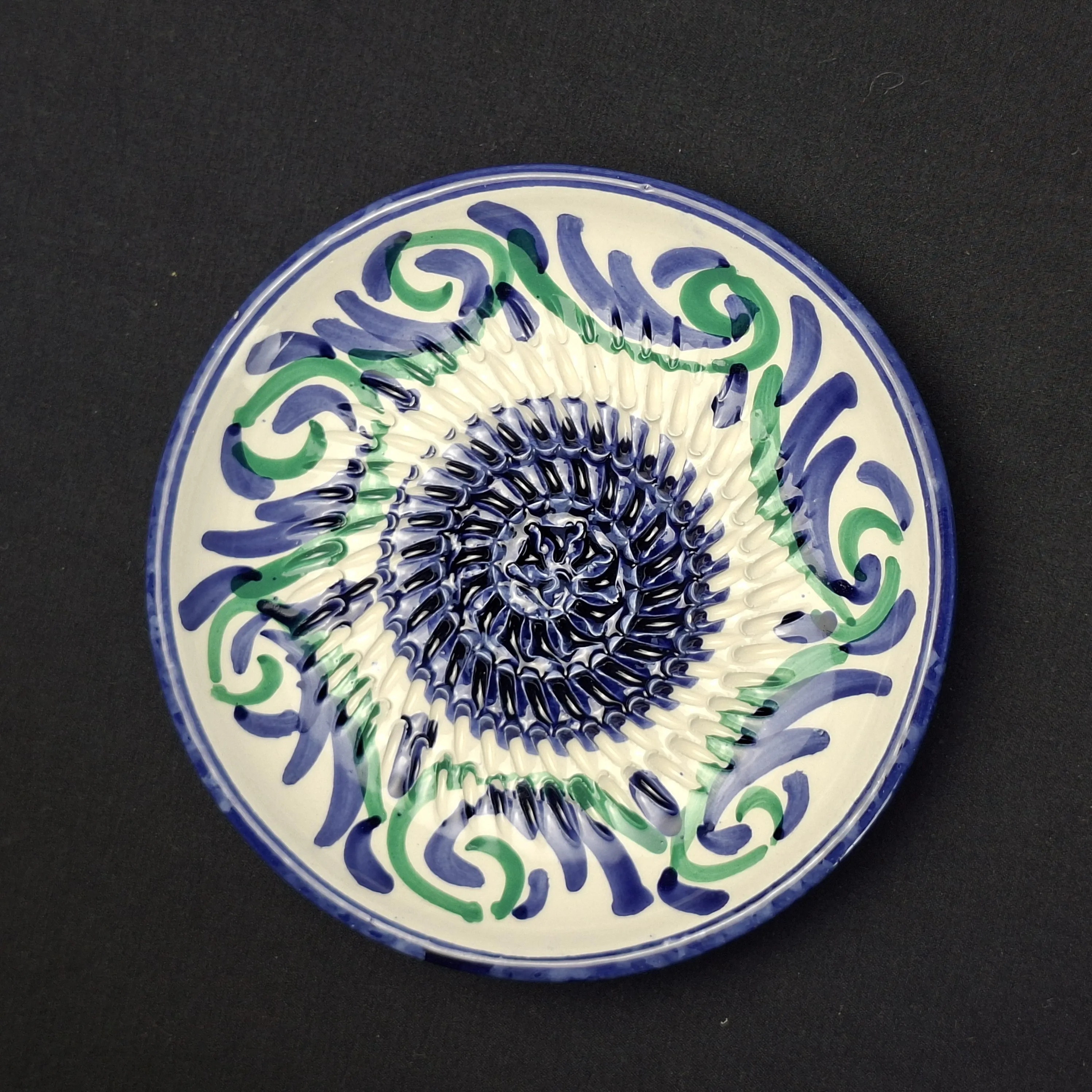 Plato rasca ajos diseño Andalucía